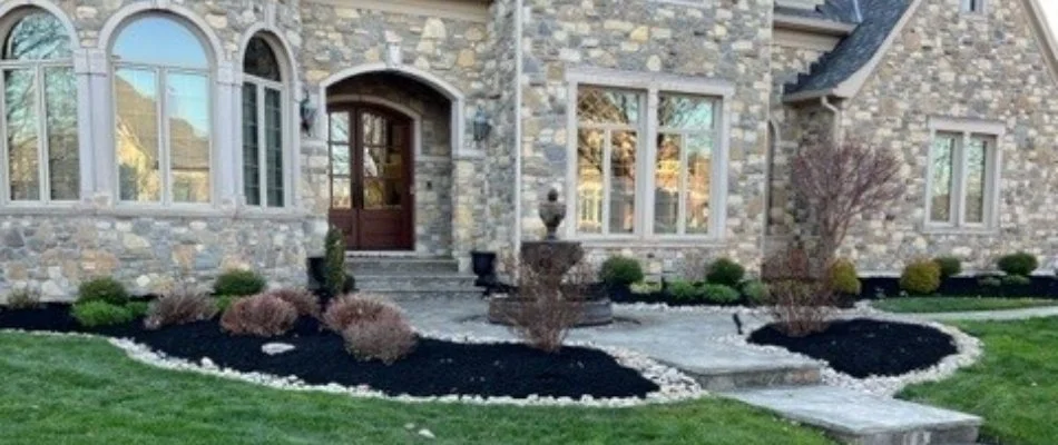 Landscaping out front of a large home in Ohio.