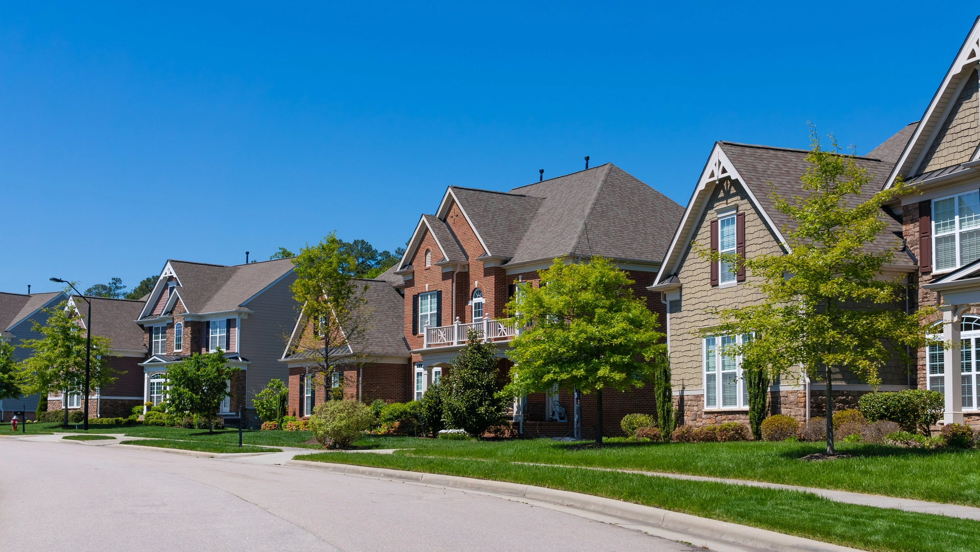 A safe neighborhood in Blue Ash, OH with healthy lawn and landscaping. 