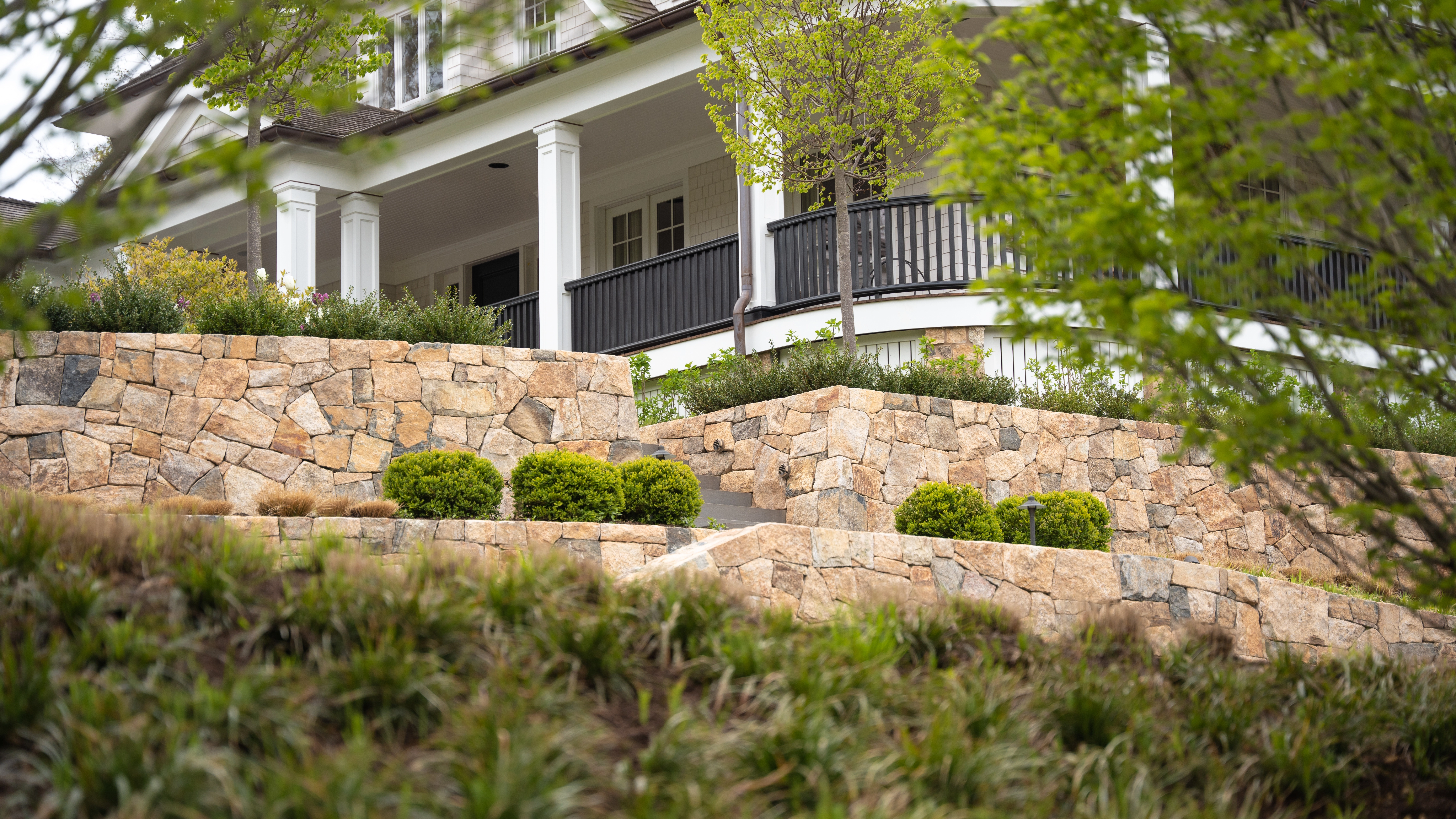 Retaining Walls Are the Solution to Your Sloped Yard!