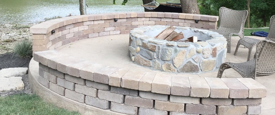 Fire pit installed over landscape in West Chester Township, OH.