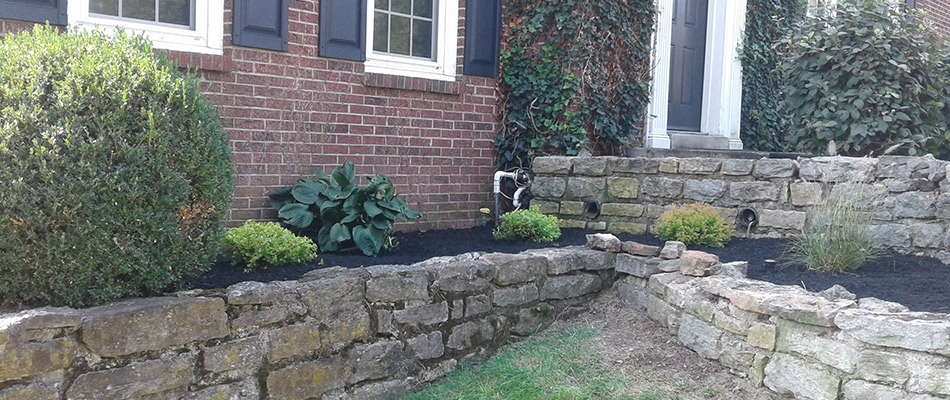 Stone retaining wall built for landscape in Liberty Township, OH.