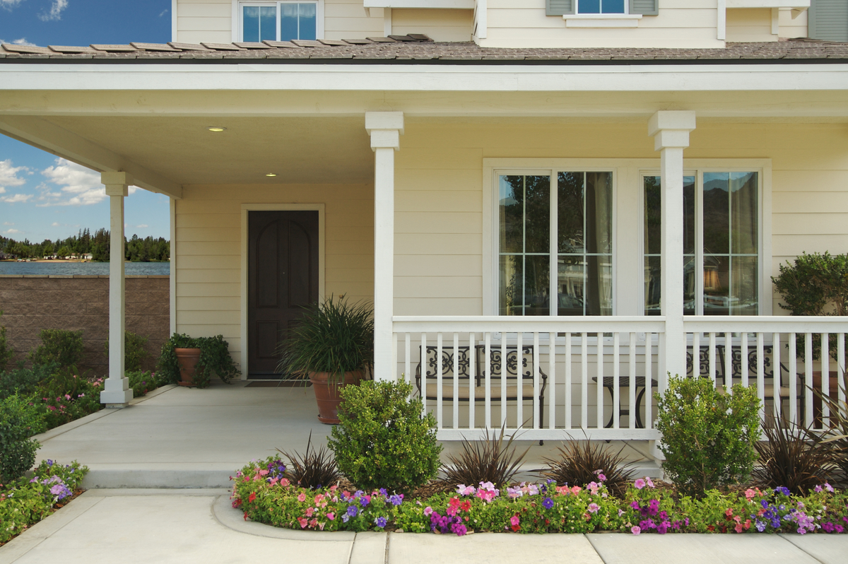 a nicely landscaped front porch area